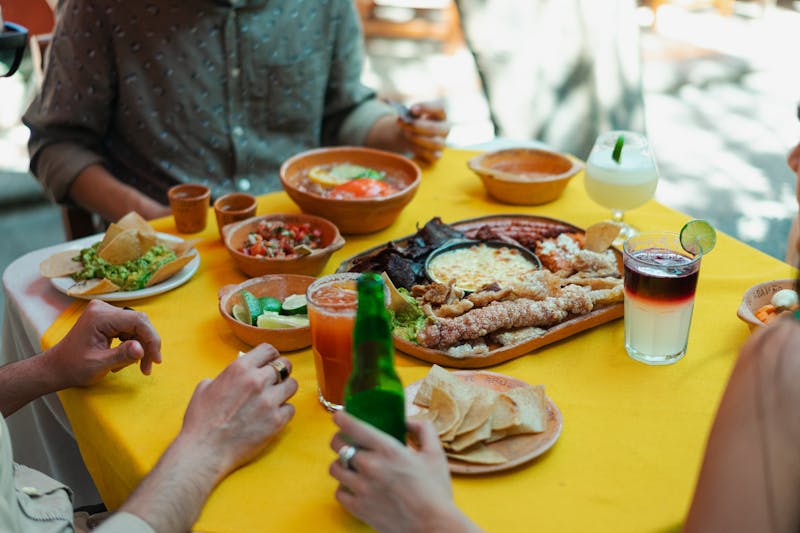 Taco Time food spread with drinks and sides